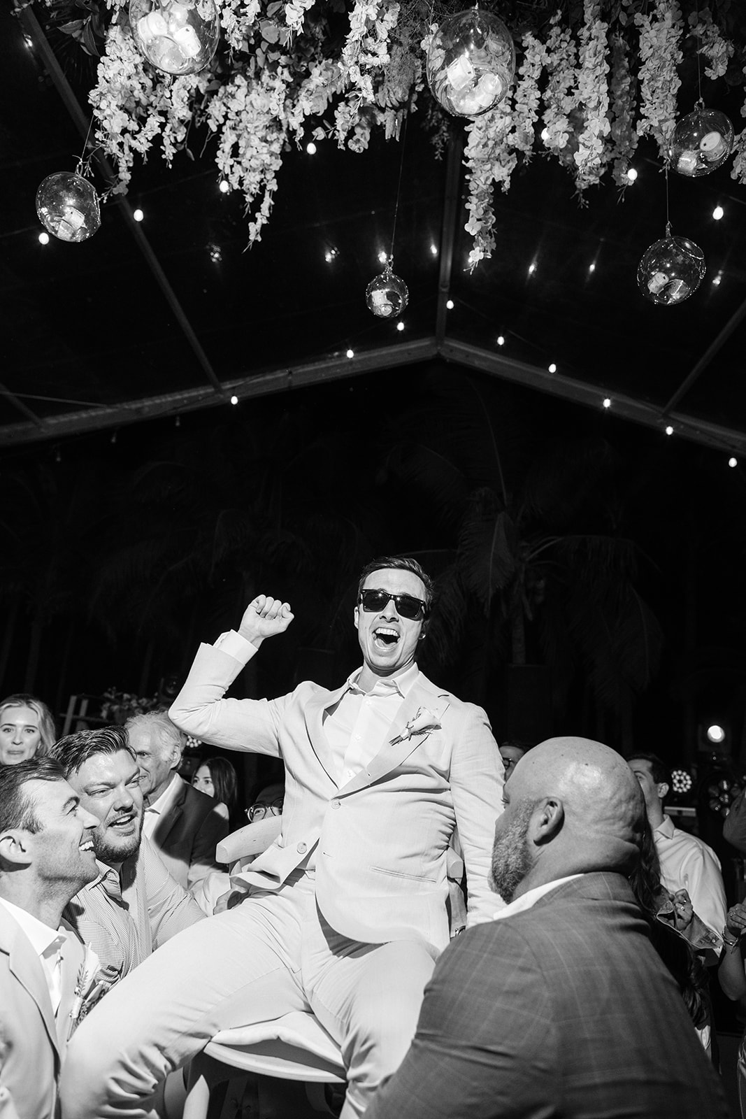 Guests dancing and celebrating, black and white, Riviera Maya wedding