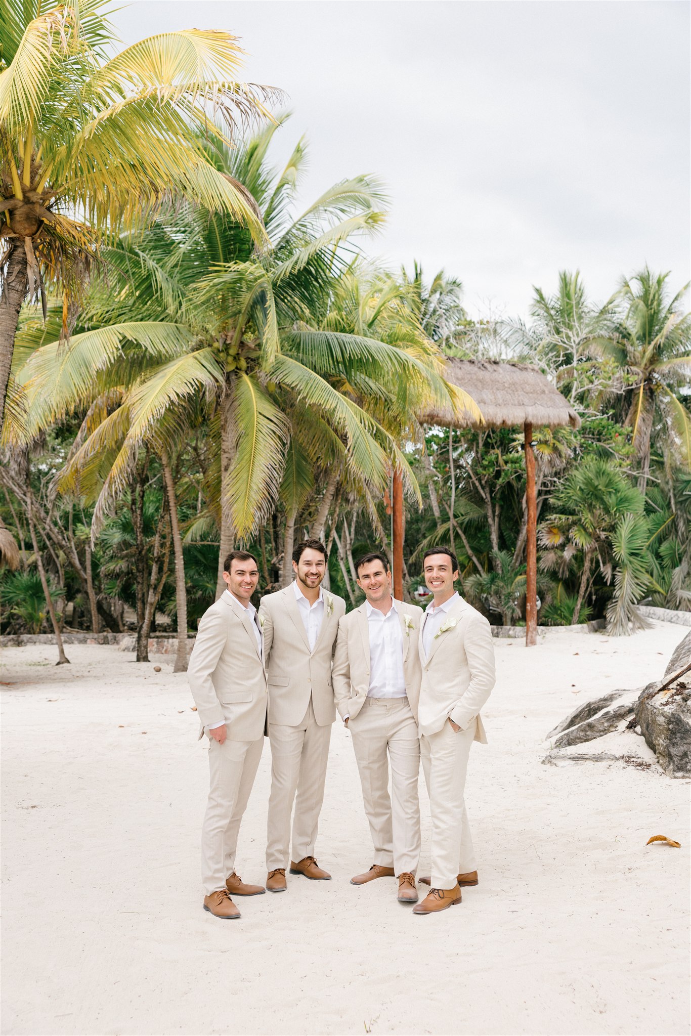 Groom and groomsmen on the beach, Saasil Kantenah Riviera Maya