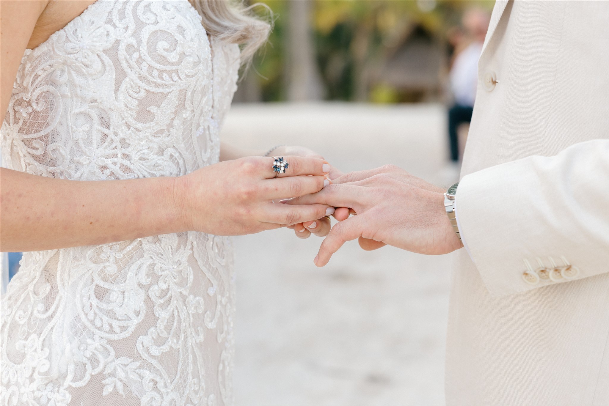 Ring exchange during beach ceremony, Riviera Maya wedding photographer