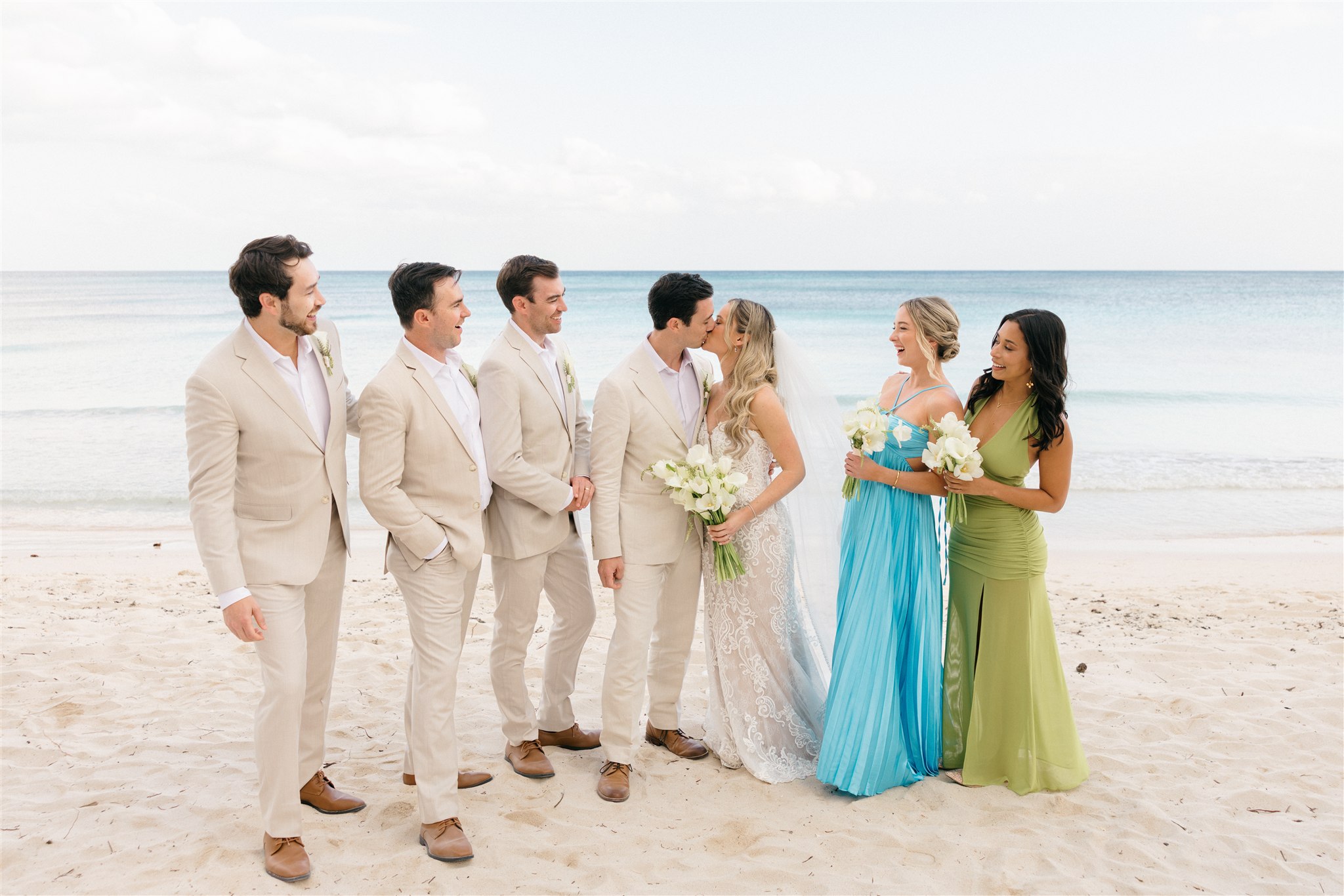 Groomsmen and bridesmaids portrait on the beach, Saasil Kantenah