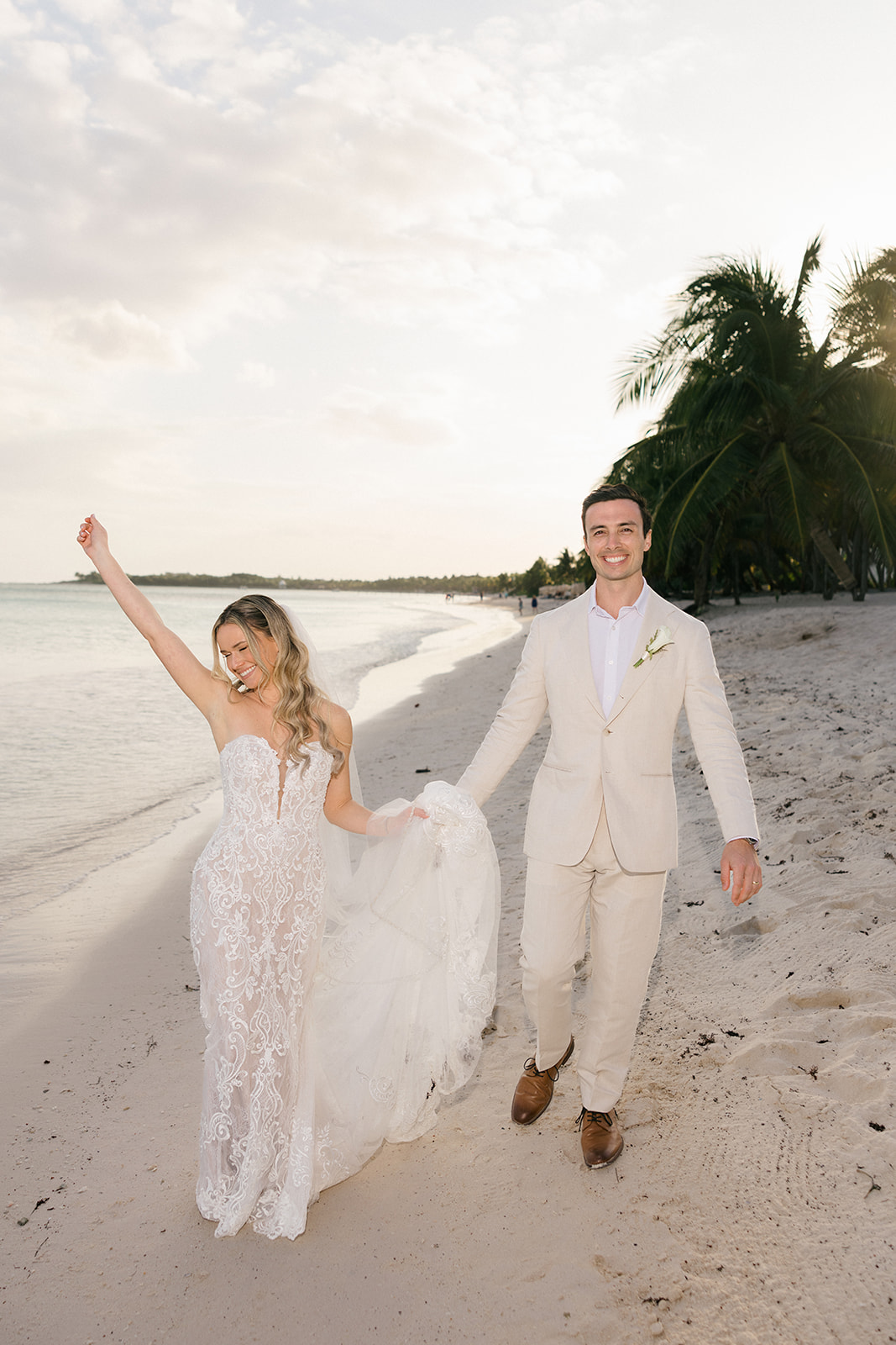 Couple walking toward the reception at Saasil Kantenah, Riviera Maya
